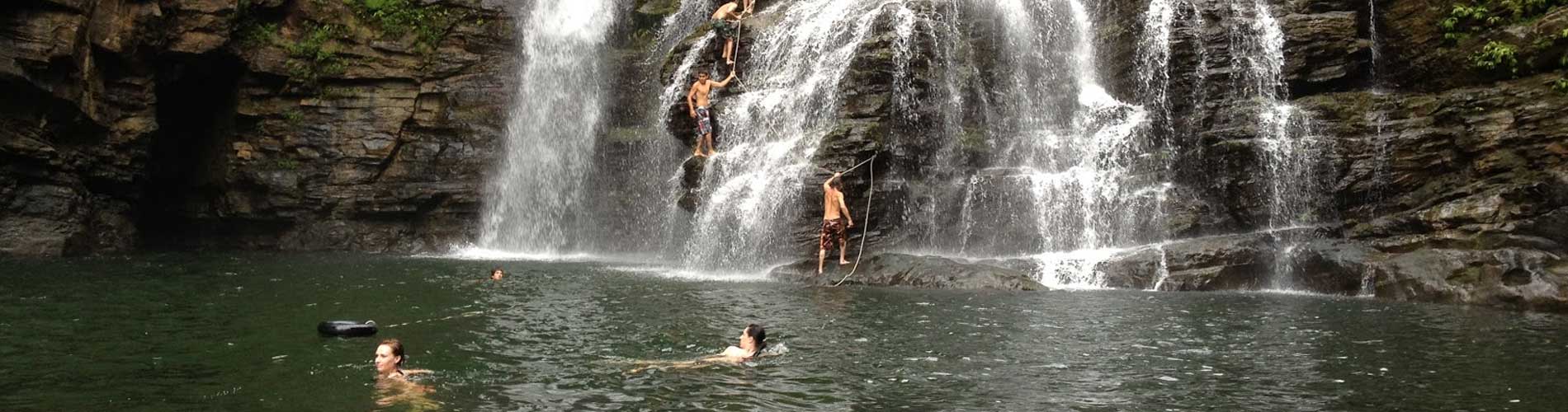 Swimming at waterfall